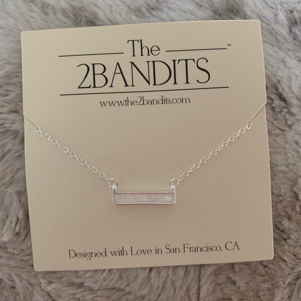 Silver bar necklace with iridescent stone